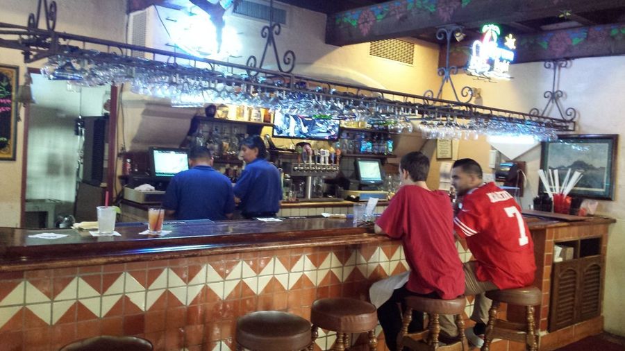 The bar, three hours before the game