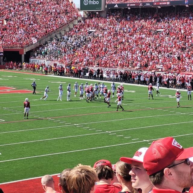 Play on the field at Memorial Stadium seen from the stands