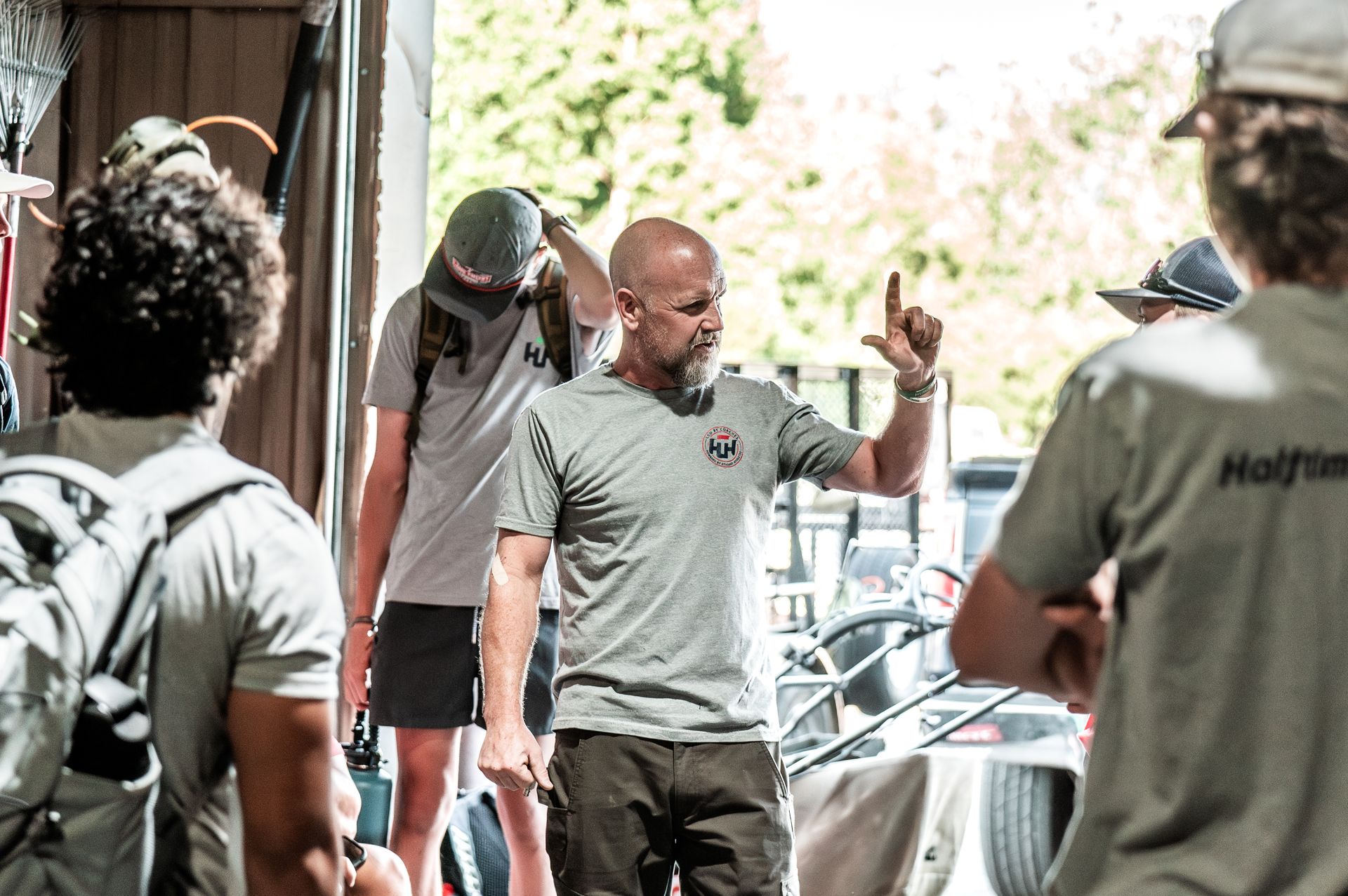 Halftime Help student-athlete preparing for a mowing day in south Denver metro