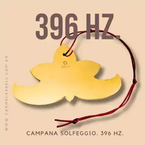 Instrumento dorado en forma de campana con una cuerda roja, etiquetado 
