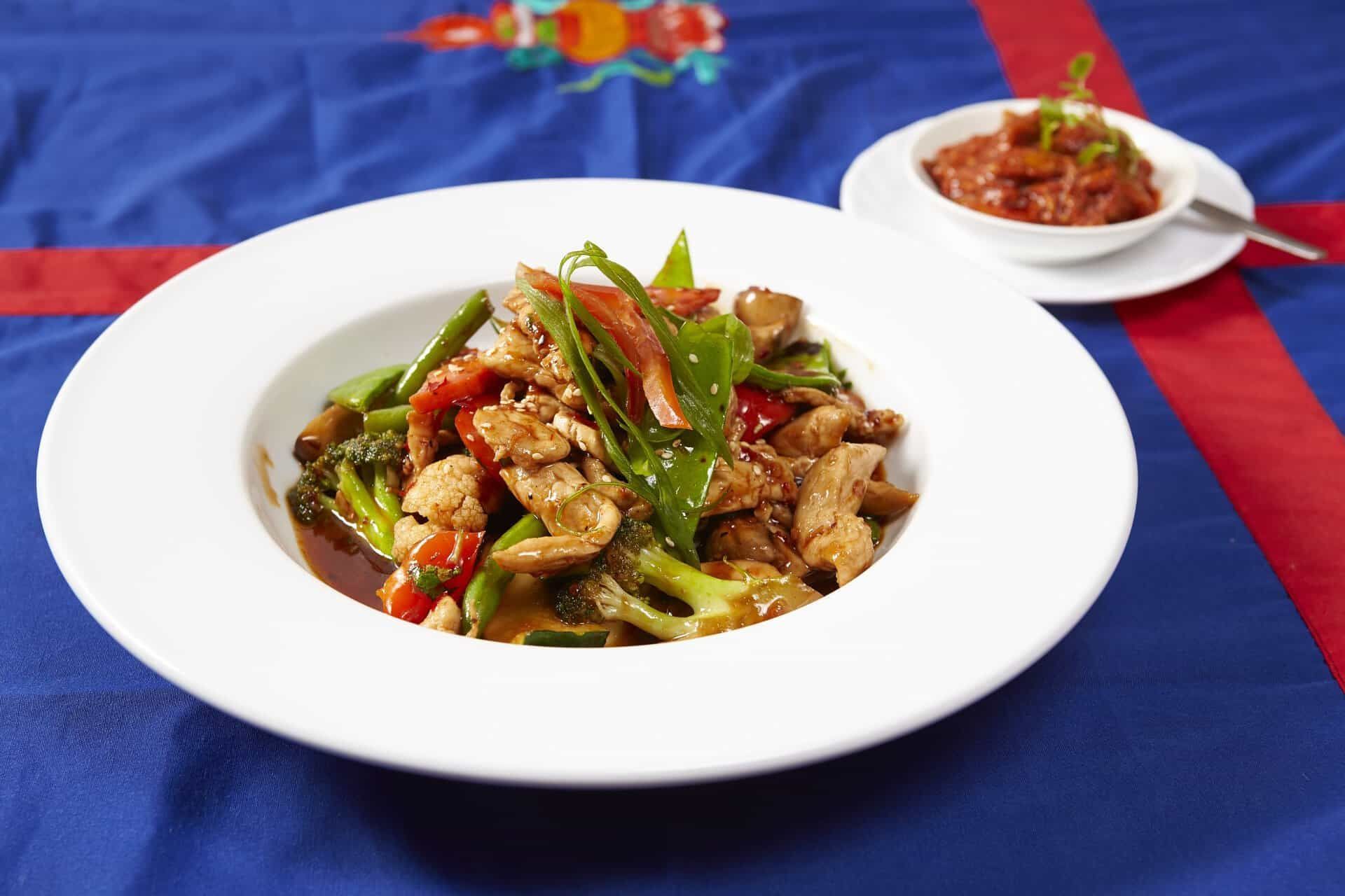 Plate of Food With Vegetables and Meat on a Table — Kathmandu Kitchen in Kingscliff, NSW