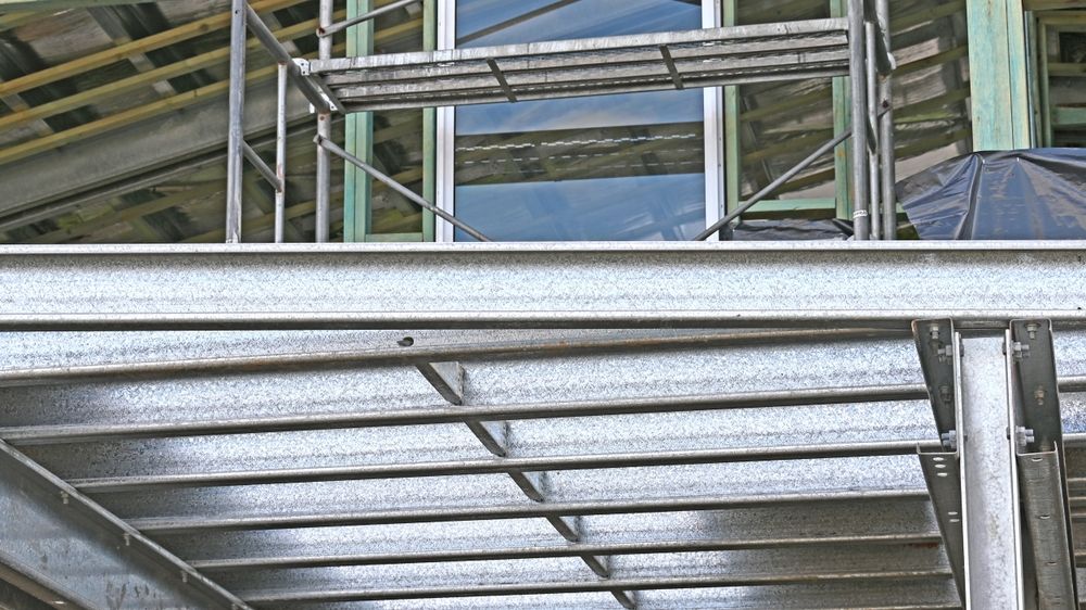 A Metal Structure With Scaffolding on Top of It is Under Construction — On The Spot Steel Fabrication in Caloundra West, QLD