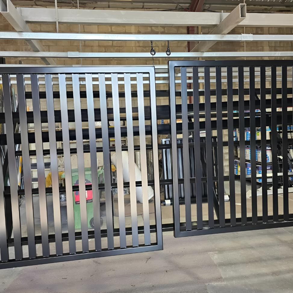 Black Metal Fence is Sitting in a Warehouse — On The Spot Steel Fabrication in Caloundra West, QLD