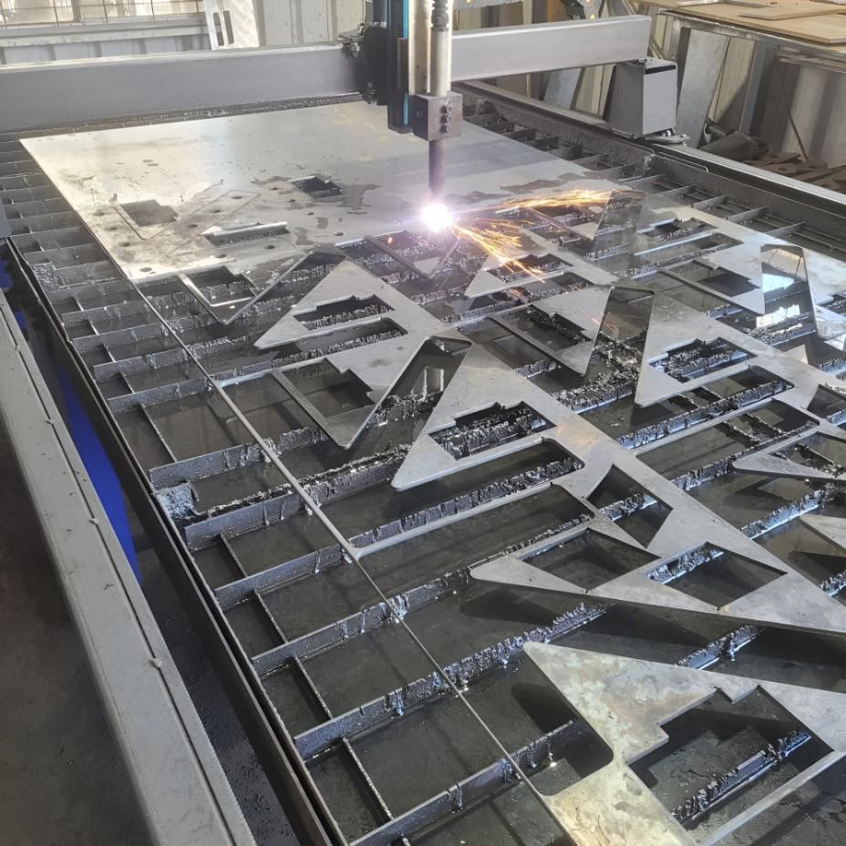 Machine is Cutting a Piece of Metal — On The Spot Steel Fabrication in Caloundra West, QLD