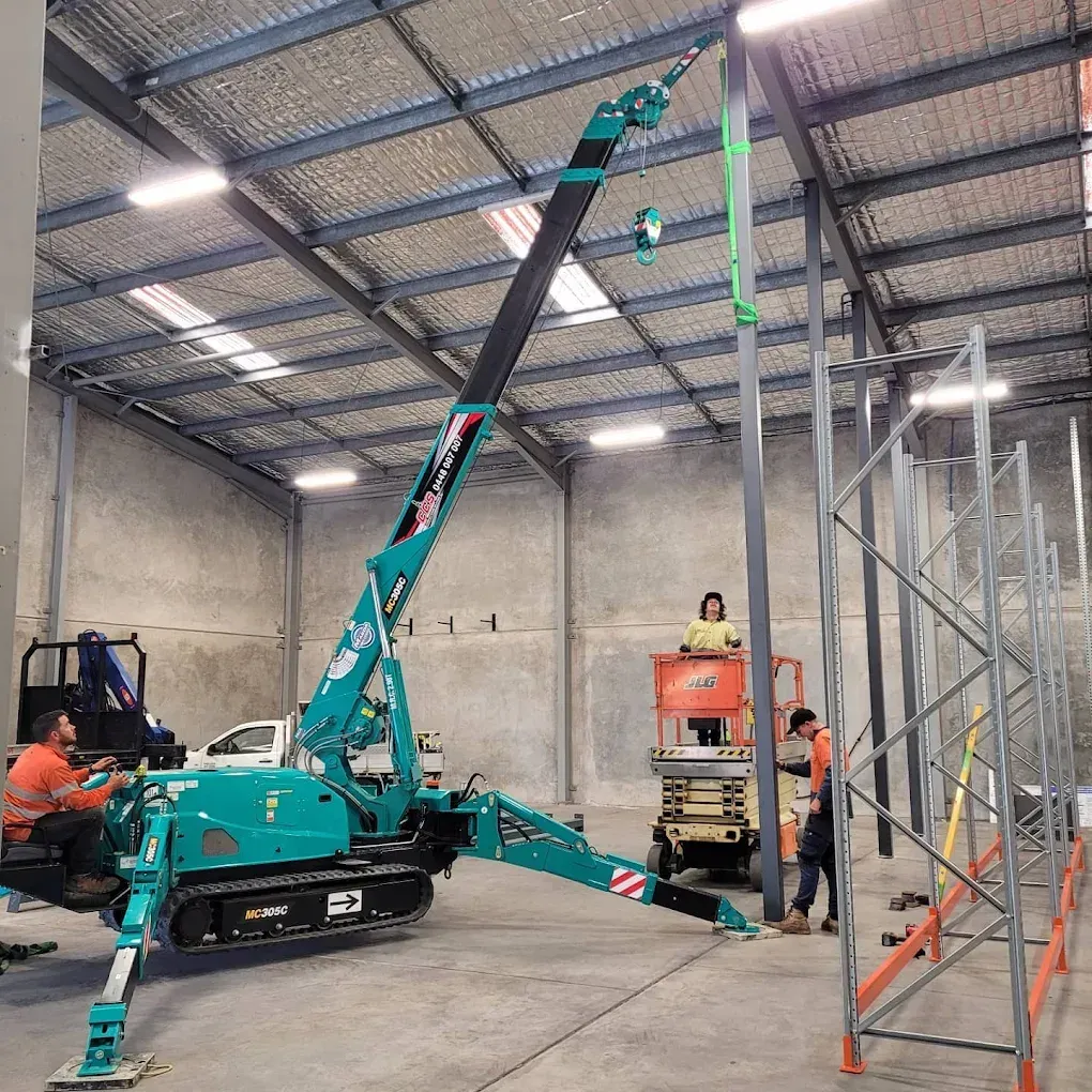 Spiral Staircase With a Metal Railing in a Warehouse — On The Spot Steel Fabrication in Caloundra West, QLD