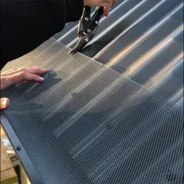 insert 30mm relief cuts in the All-Flow Gutter Guard on top of every second roof ribs
