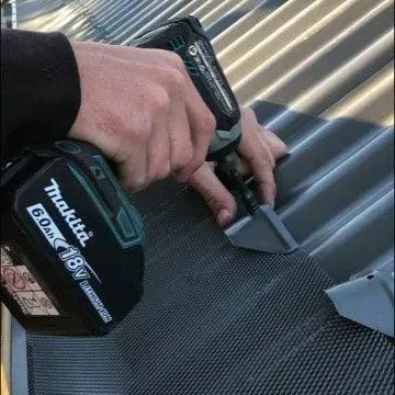screw in place the saddles that will secure the All-Flow Gutter Guard to your metal roof