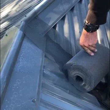 attach gutter guard to ridge capping then roll down to metal roof valley