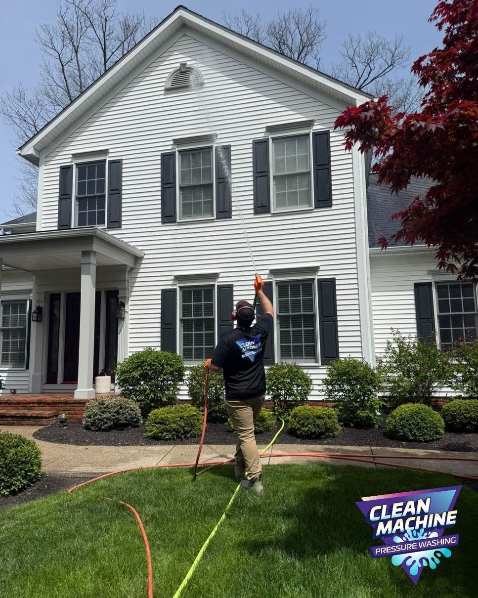 Clean Machine soft washing a residential exterior in Northeast Ohio