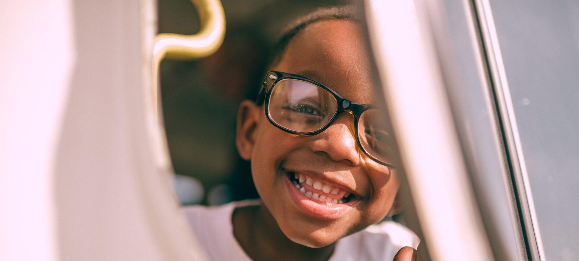 child in glasses