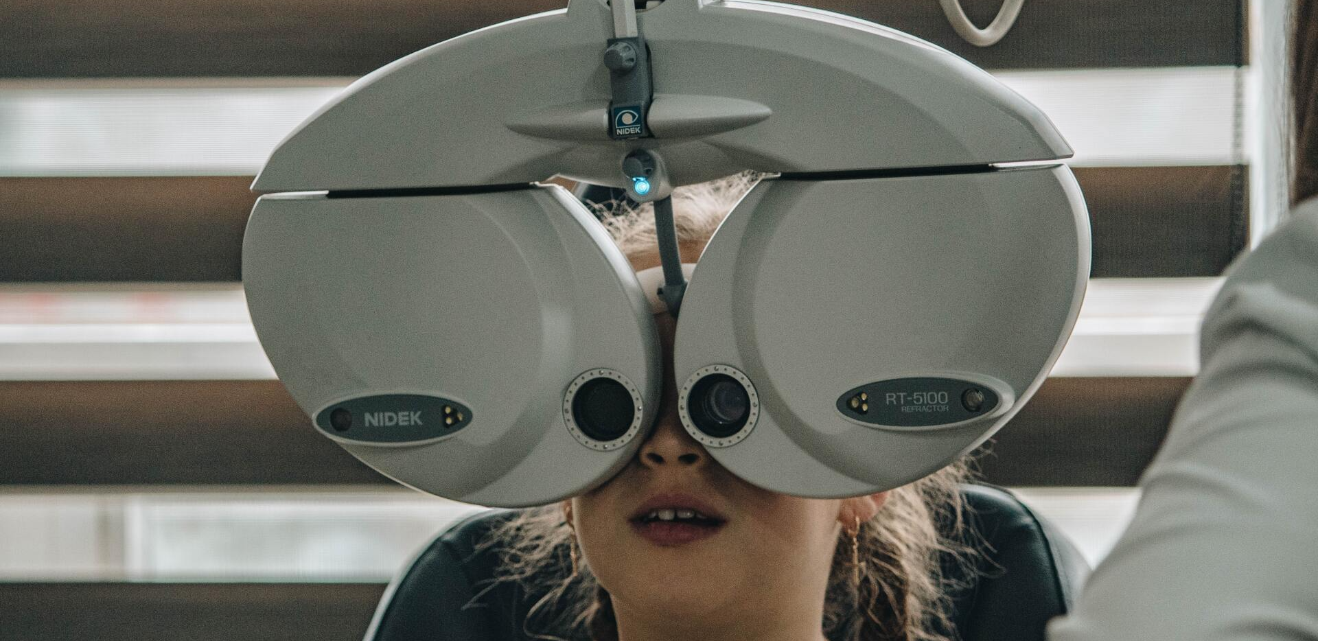 girl getting eye exam