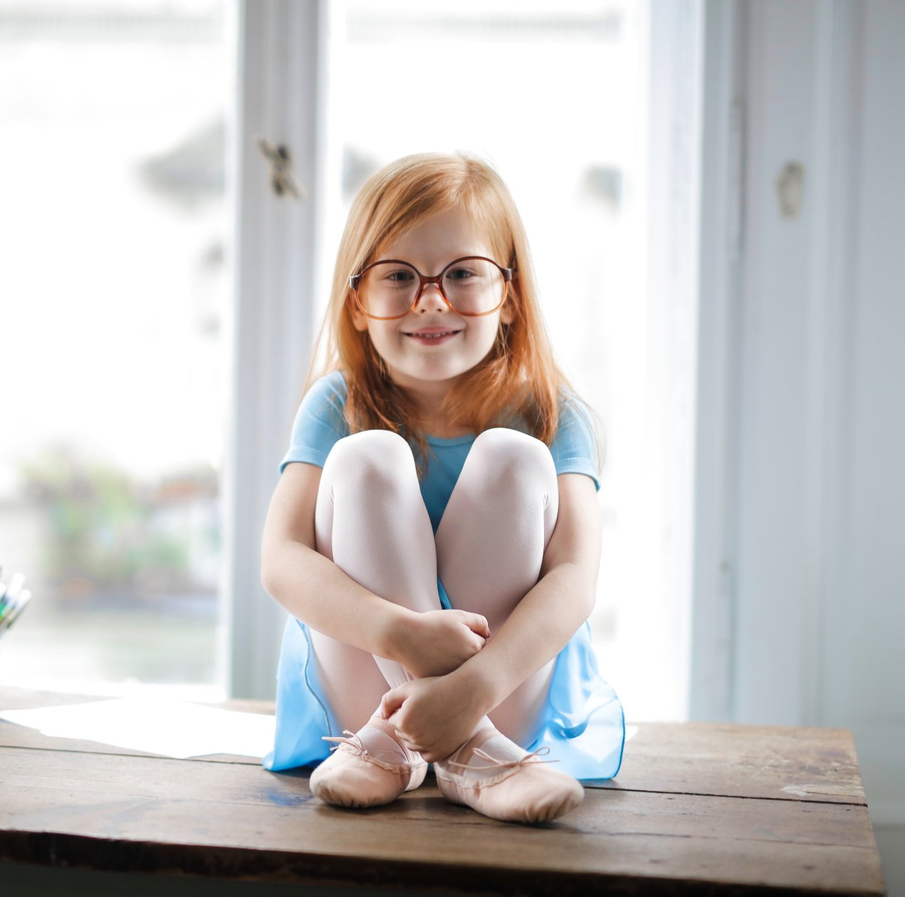 child in glasses