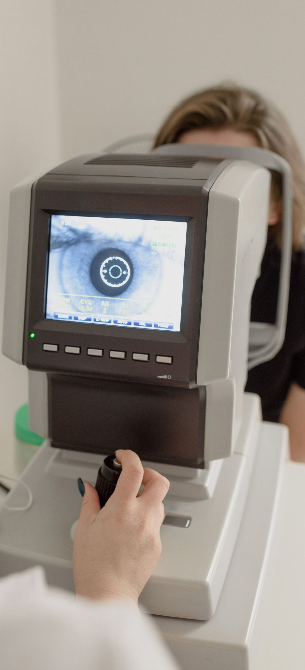 woman getting eye exam