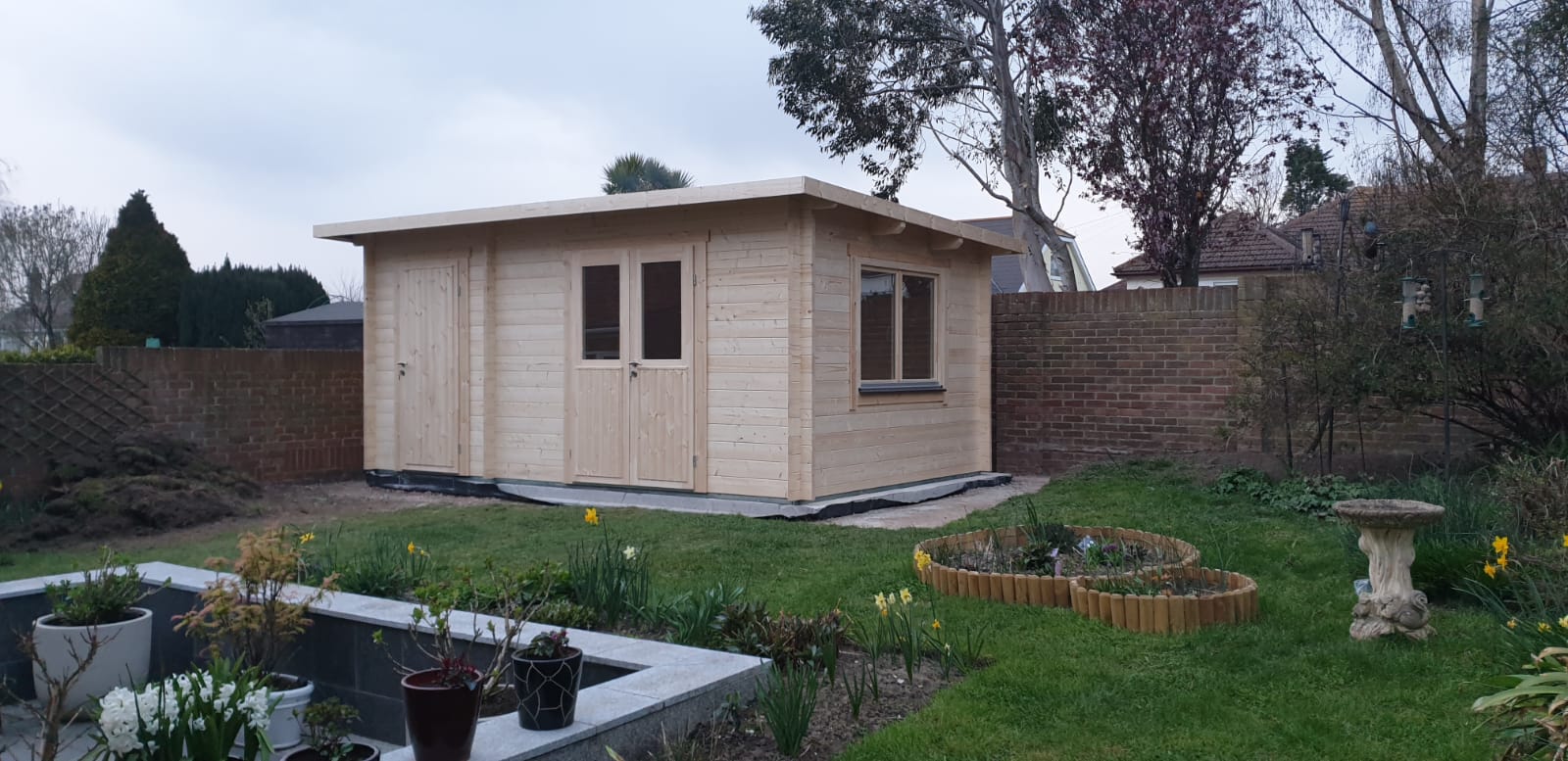 log cabins and sheds, which is better?