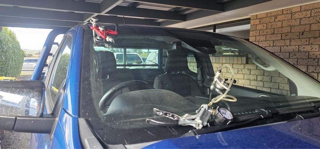 A windshield is being repaired A windshield is being repaired