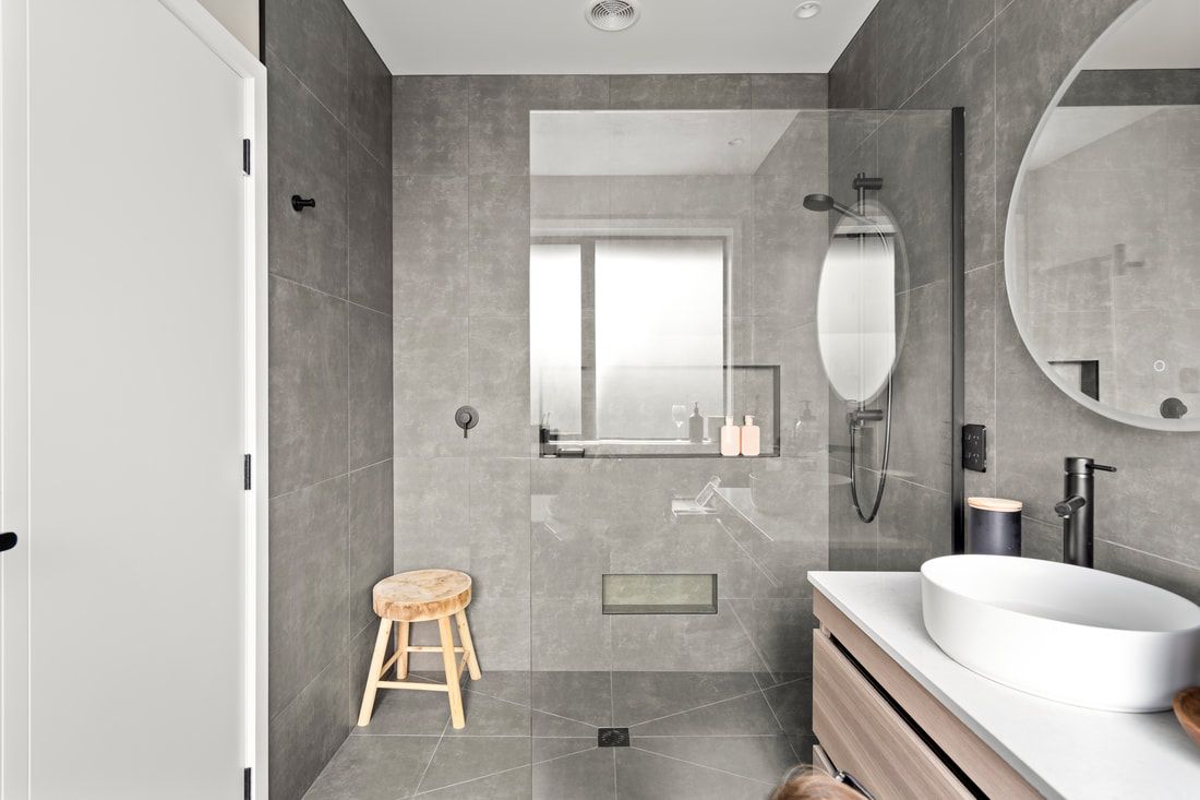 Tiled shower in an NMS Homes completed home