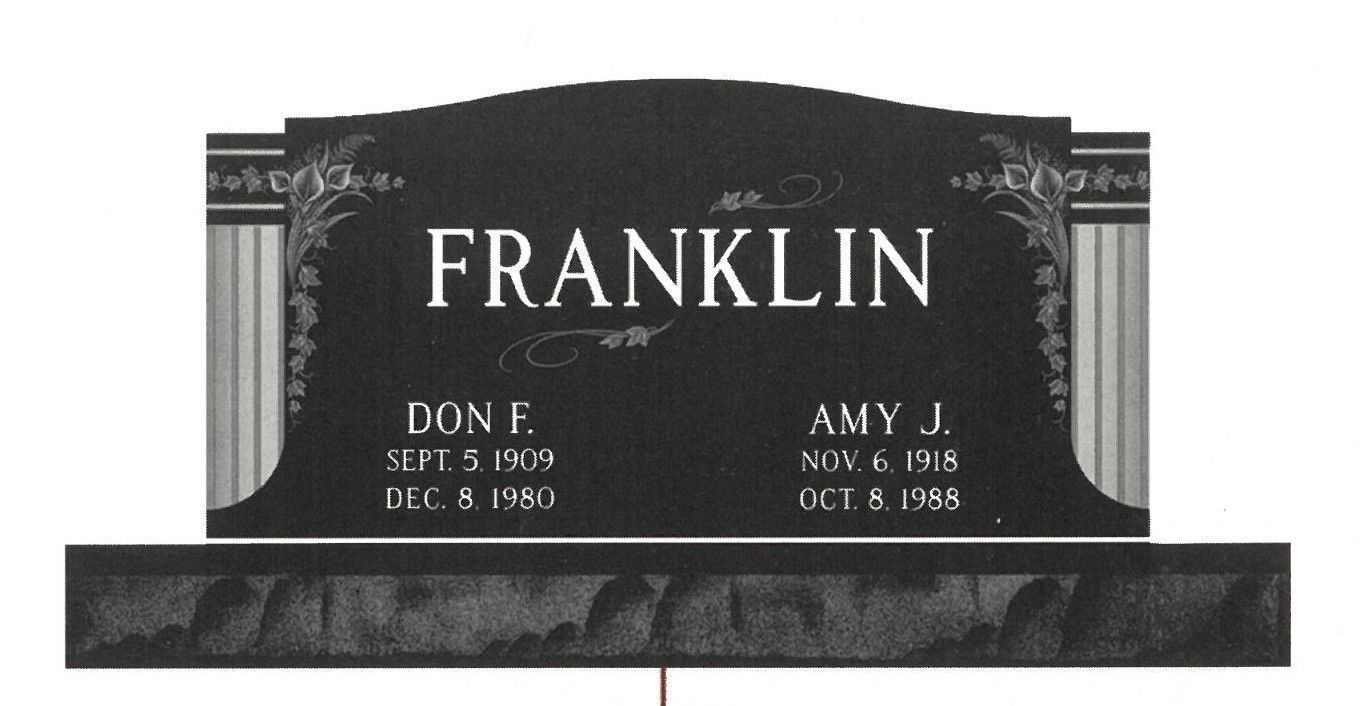 Black granite double gravestone engraved “FRANKLIN” with two names and dates, set on a pedestal.