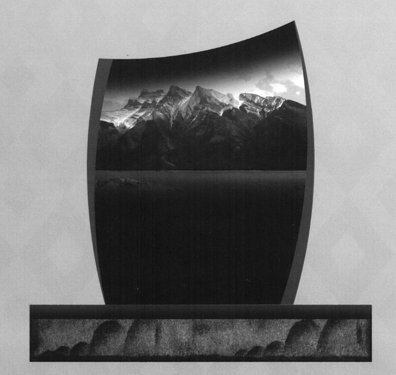 Black-and-white landscape photo of mountains on a curved, vertical panel above a narrow base