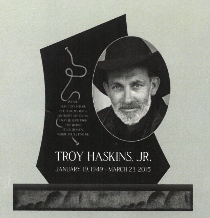 Tombstone plaque with portrait medallion and the name Troy Haskins Jr., dated January 19, 1949–March 23, 2015