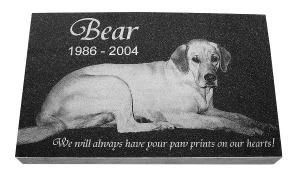 Black memorial plaque for Bear, 1986–2004, with a dog portrait