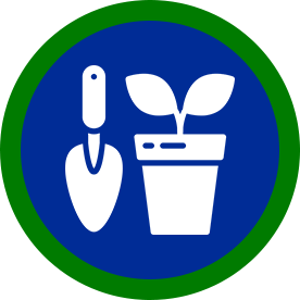 Gardening icon: white trowel and potted seedling on blue circle with green border.