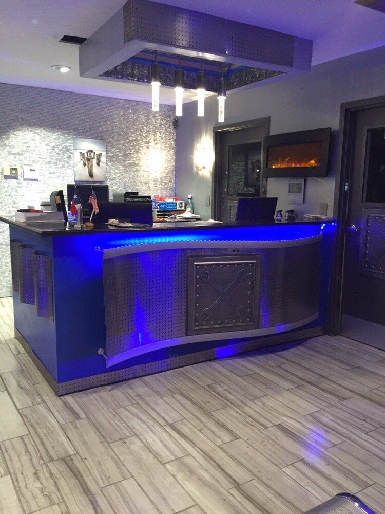 Modern Reception Area With Blue Ambient Lighting | Discount Inspection and Brakes