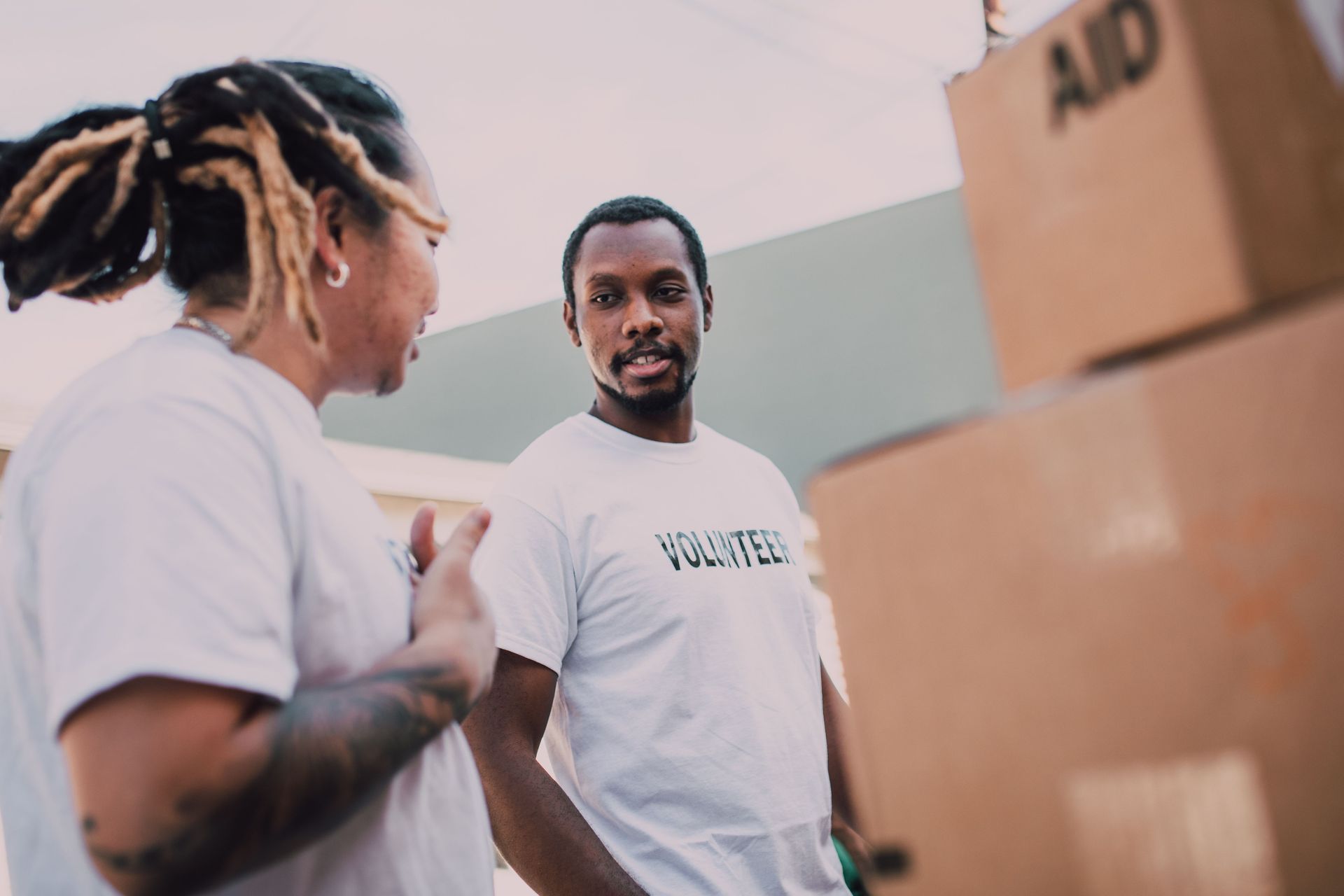 Volunteers packing donation boxes together