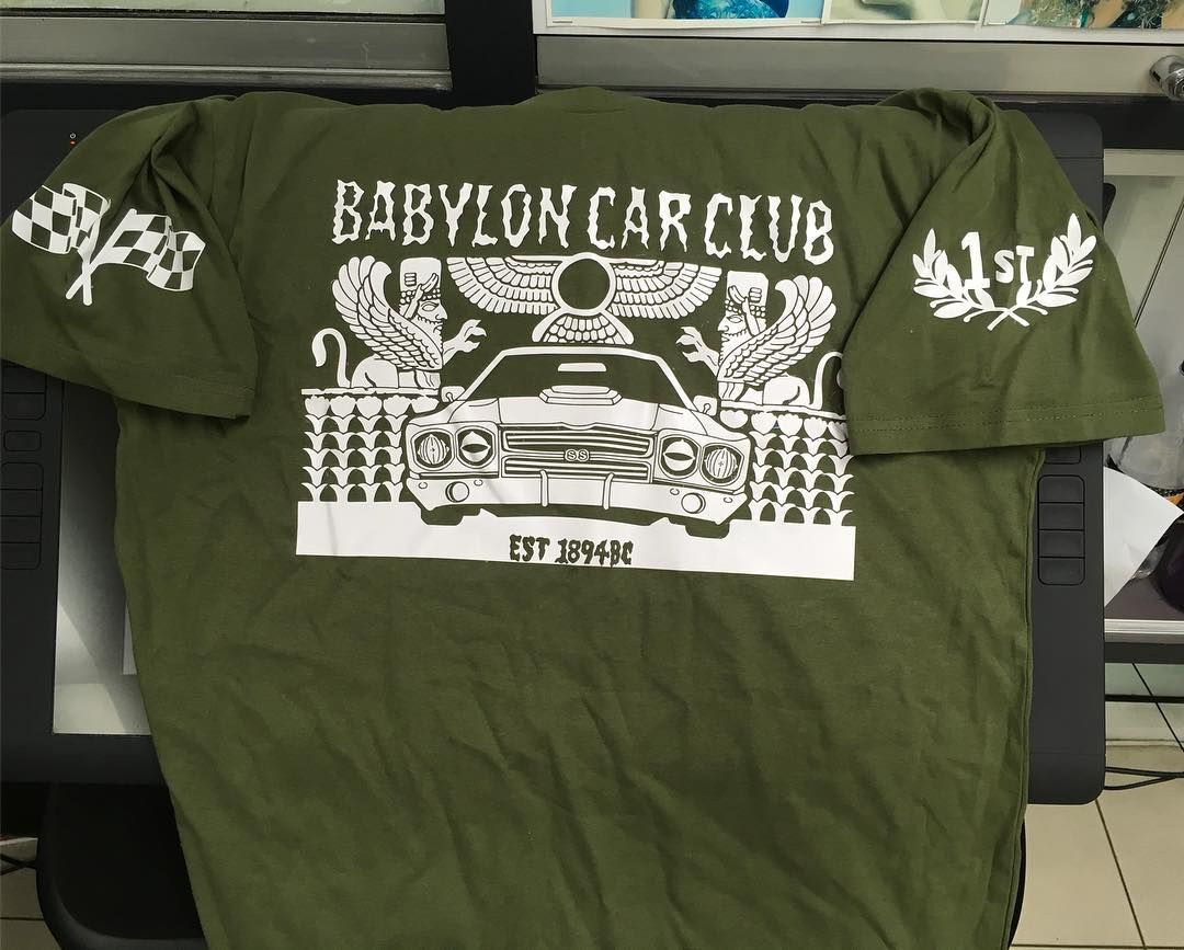 A Green Printed Shirt With A White Design - Cairns Custom T-Shirts In Cairns City, QLD