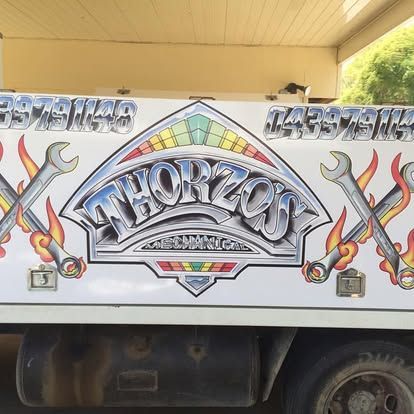 A white truck with the word Thorzo's on it — Cairns Custom T-Shirts In Cairns City, QLD