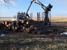 logging truck loading logs