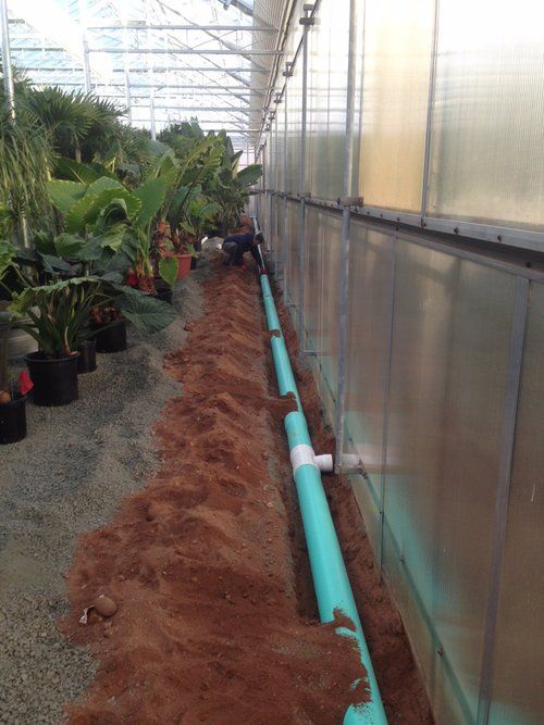 In Greenhouse Drainage Repairs