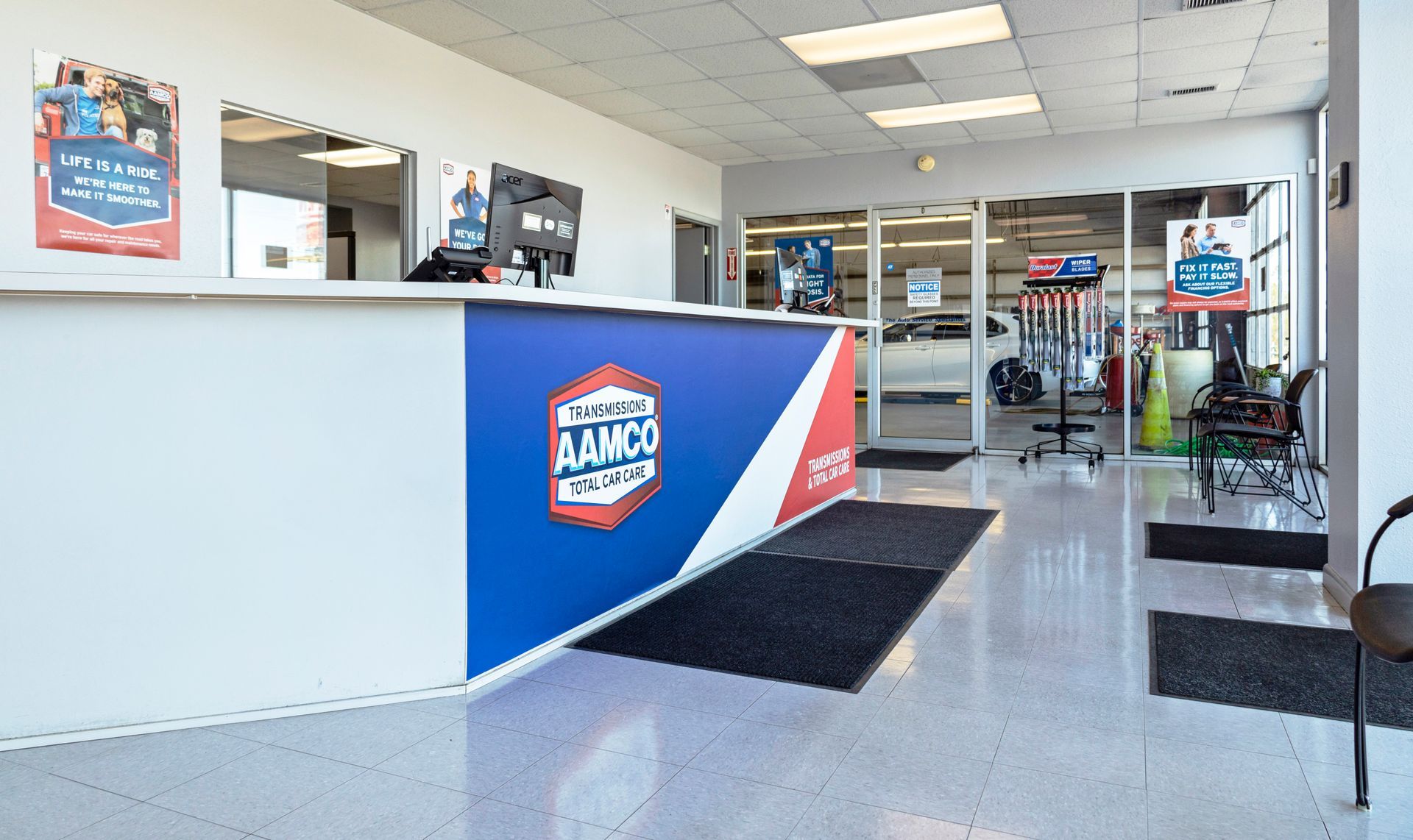 Inside view of an AAMCO Service Center lobby in Port Richey, FL.