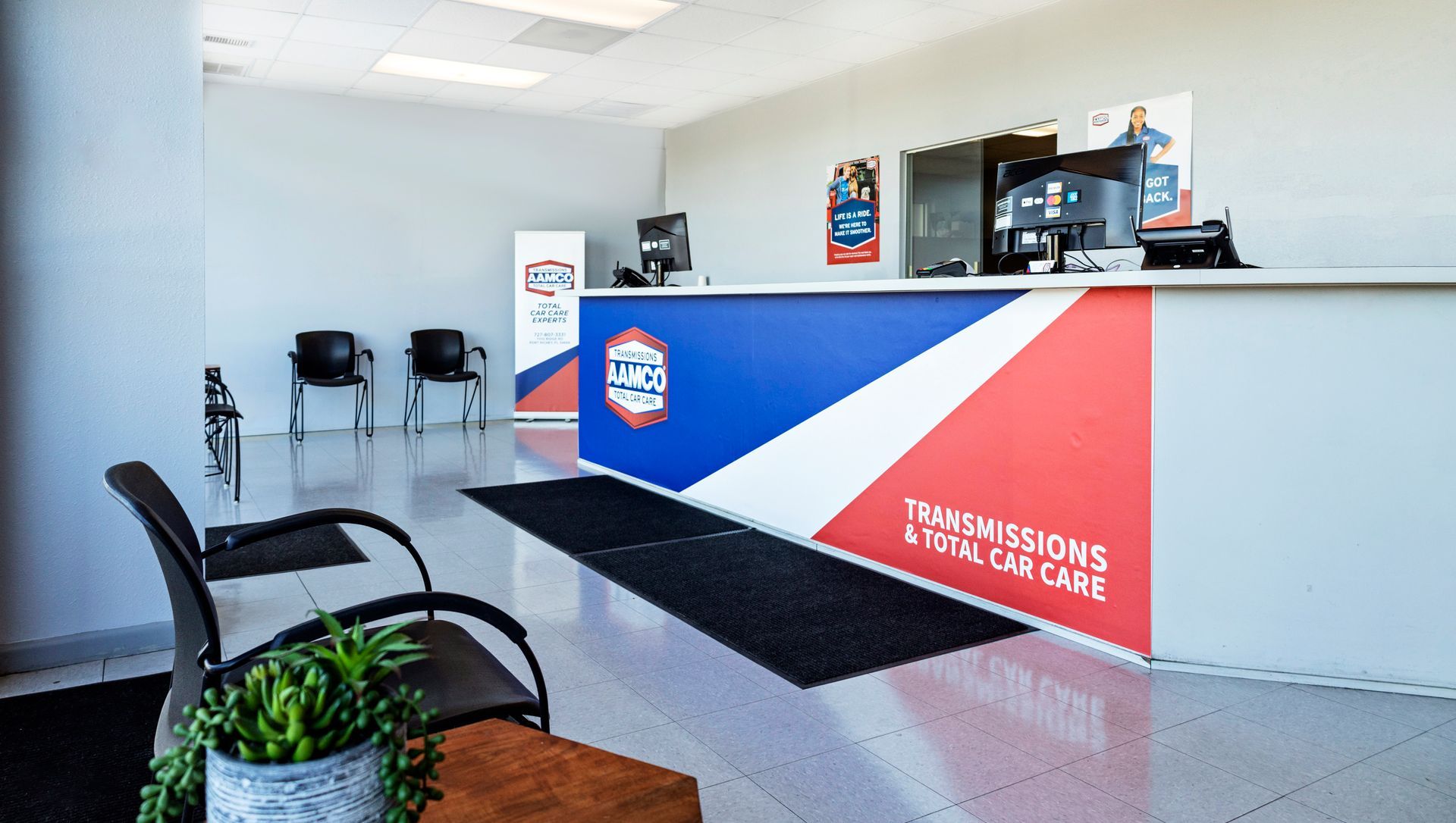 Inside view of an AAMCO Service Center lobby in Port Richey, FL.