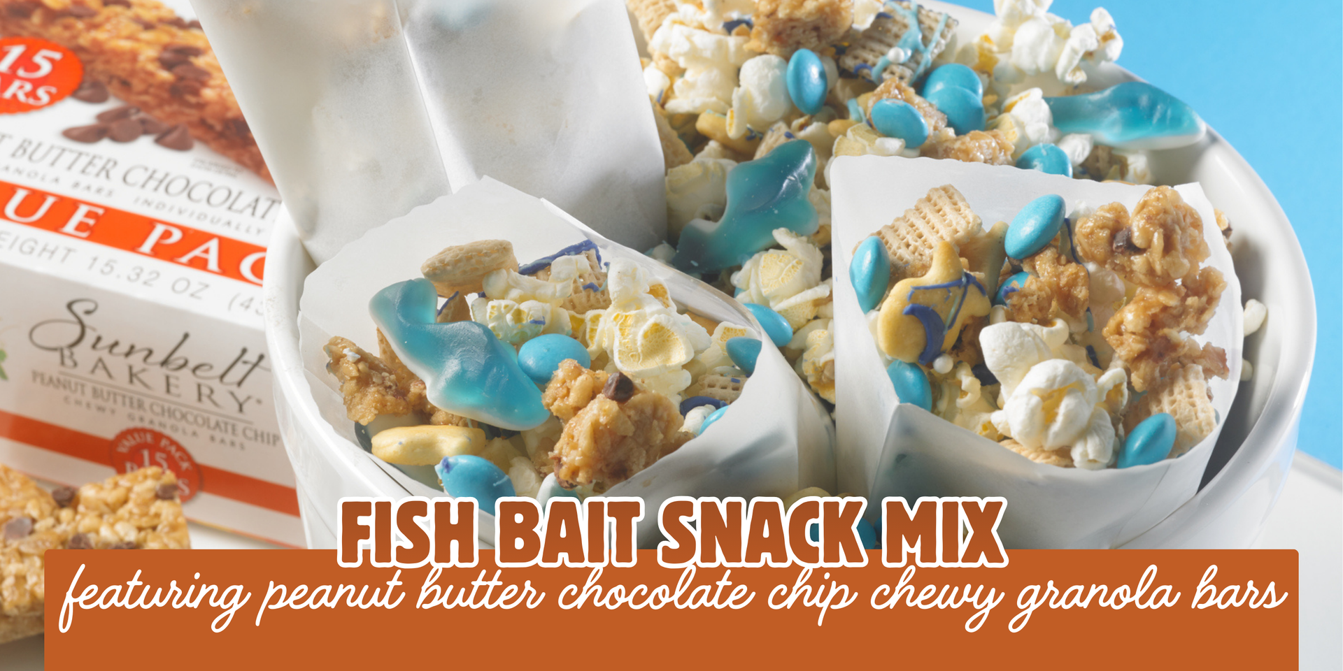 snack mix with shark gummy candy, granola bars and popcorn