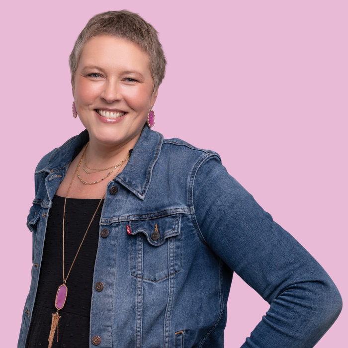 NBCF stock image of woman smiling in jean jacket