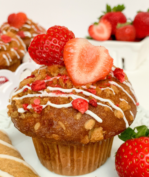 muffins make with strawberry soft baked bars and topped with fresh strawberries