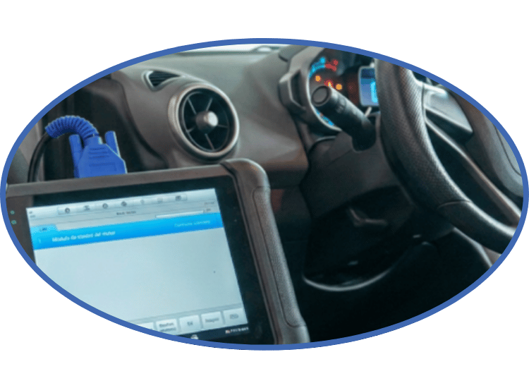 Car dashboard with a diagnostic tablet showing a blue interface and the steering wheel visible.