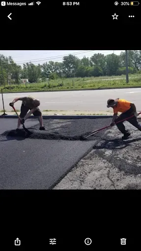 Working on asphalt installation