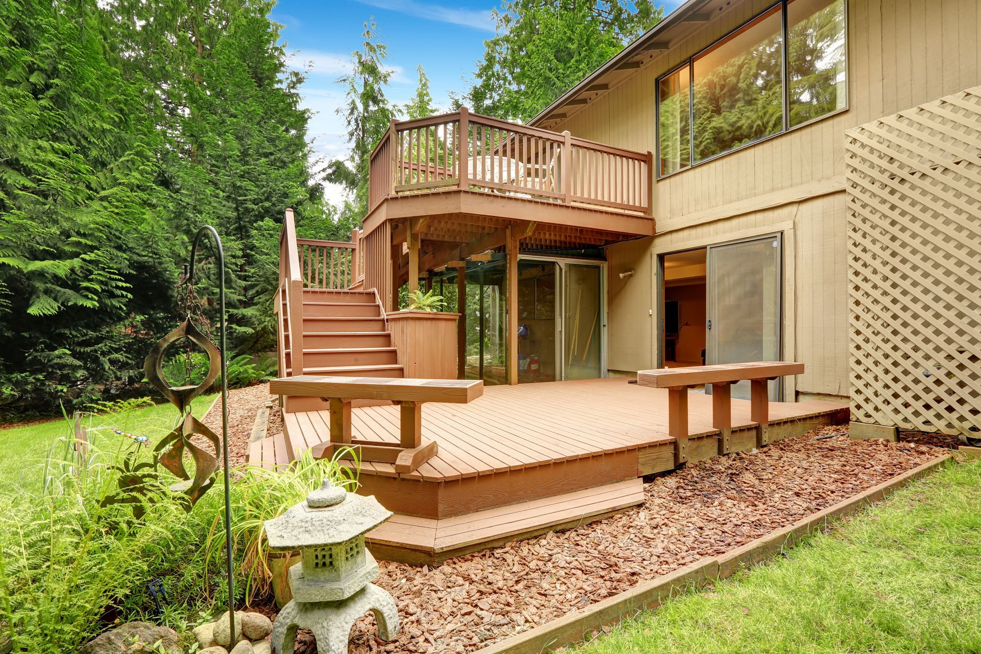 Two-story house with wooden decks