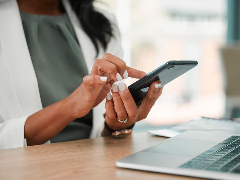 photo of hands using a smart phone
