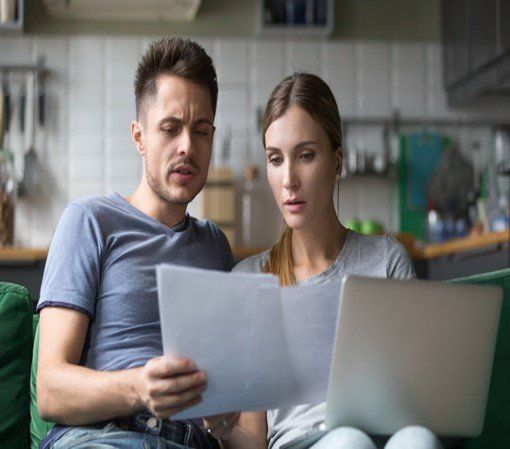 Couple Looking At Papers And Files — Coconut Creek, FL — Trouble In Paradise Couple Looking At Papers And Files — Coconut Creek, FL — Trouble In Paradise
