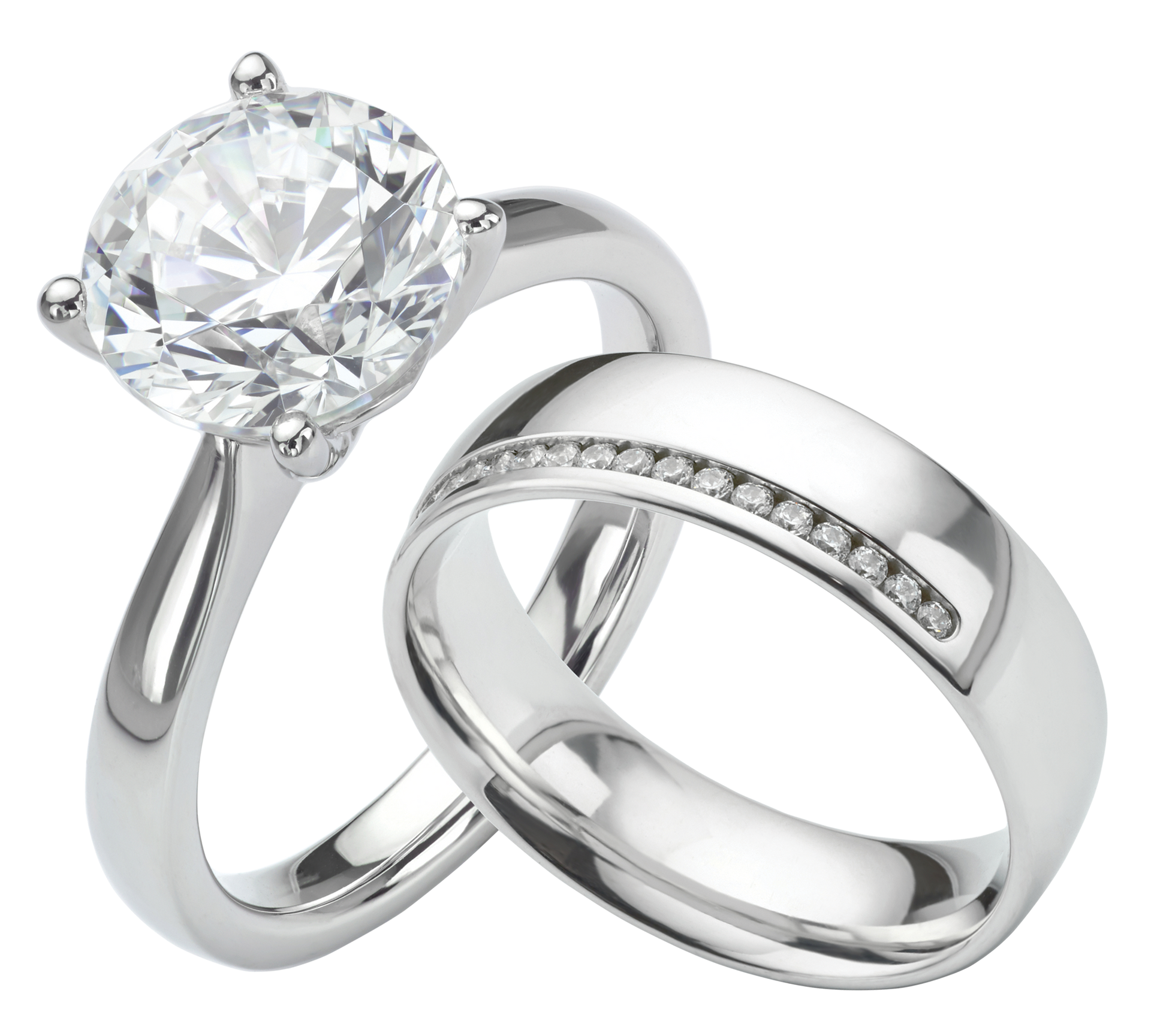 Matching platinum wedding bands with a solitaire diamond and pavé accent stones