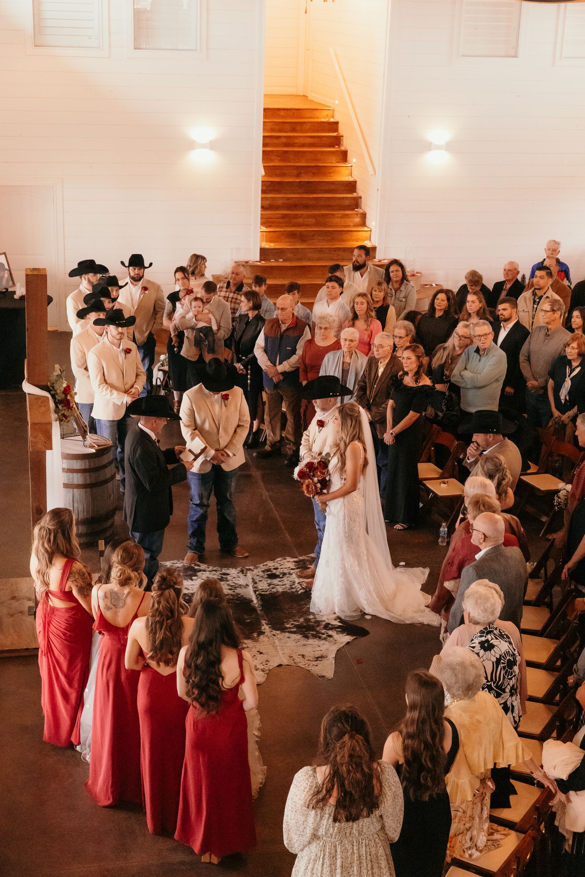father handing off bride during wedding ceremony