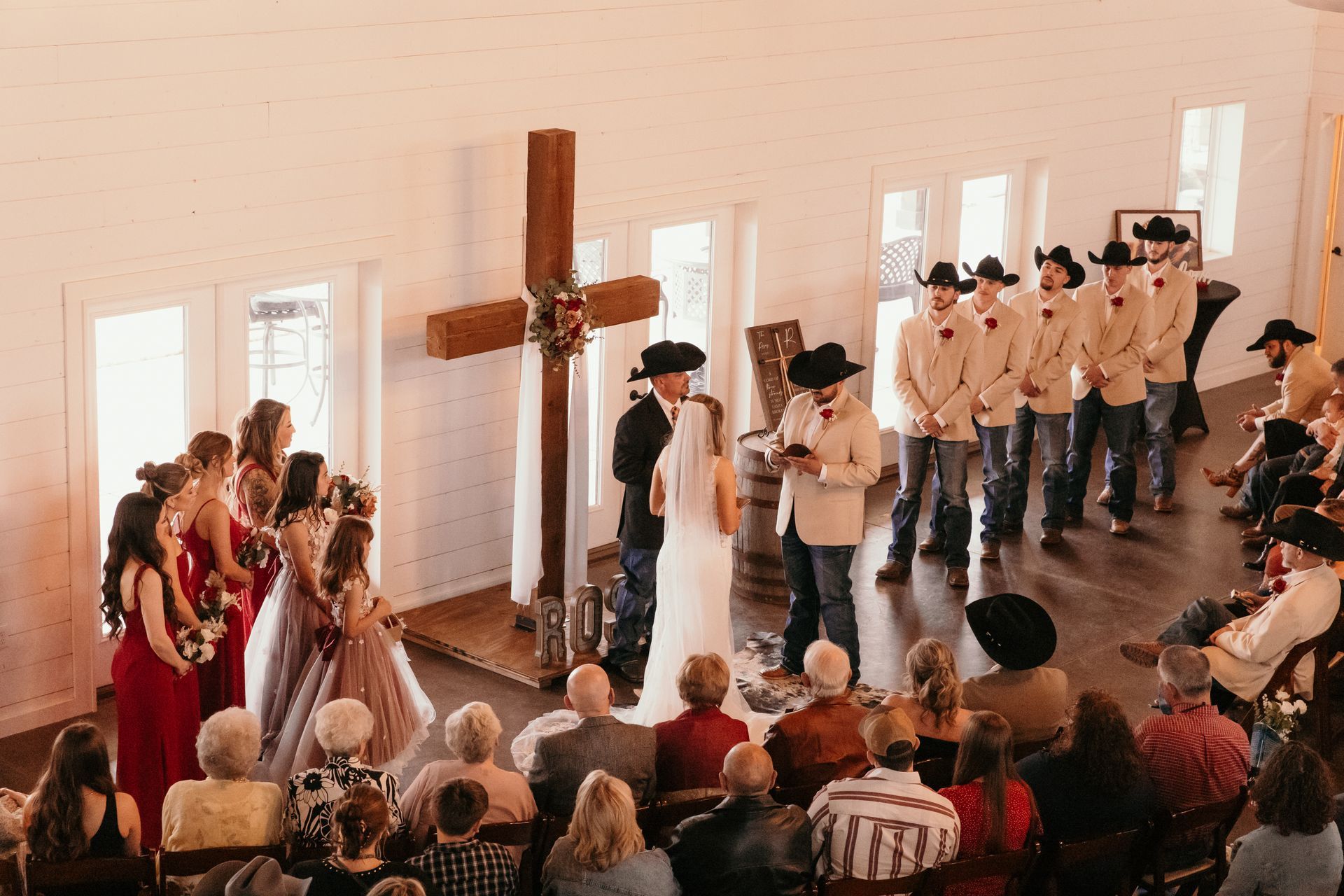 couple saying vows during indoor wedding ceremony