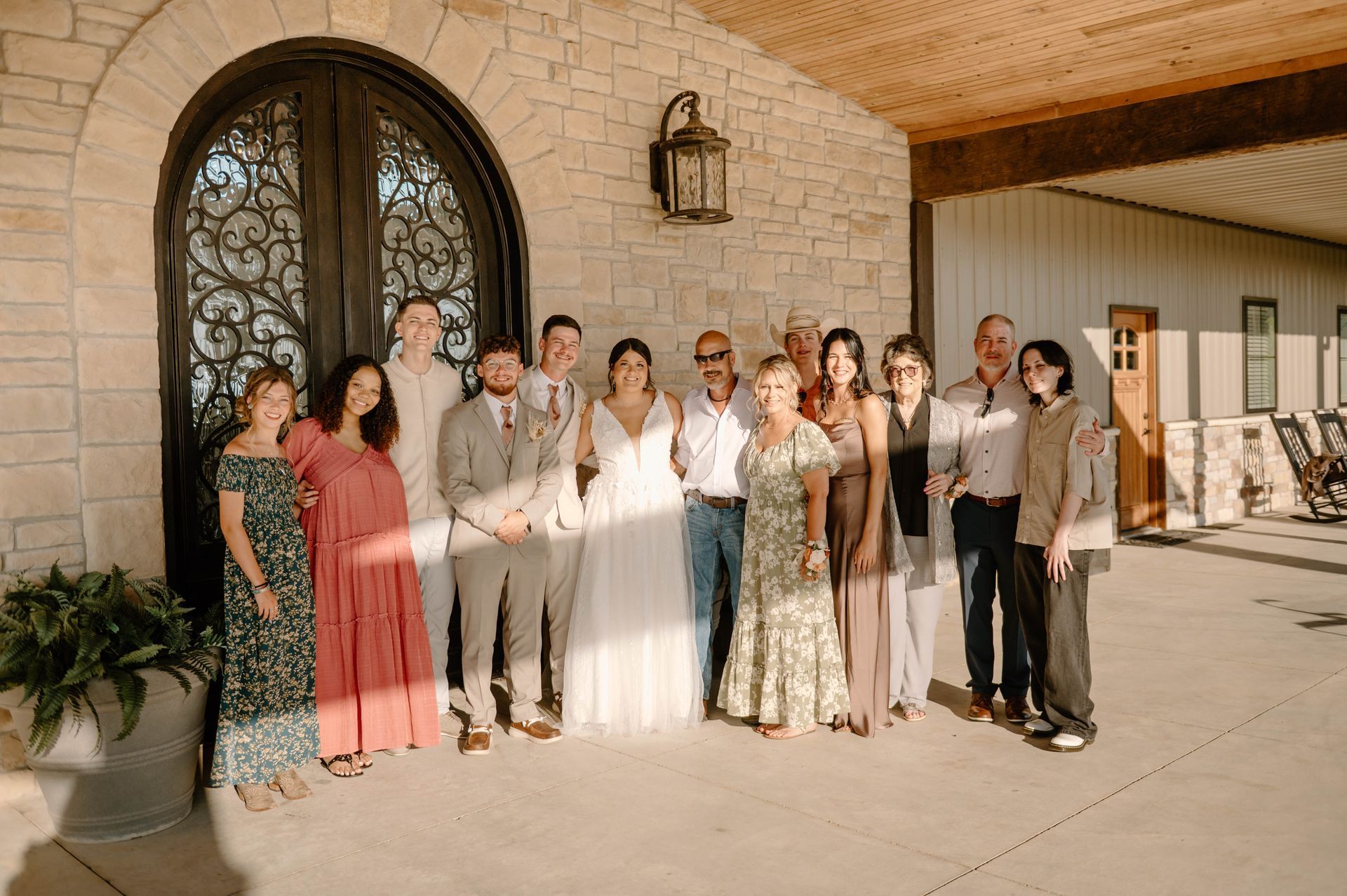 bride with family on venue porch