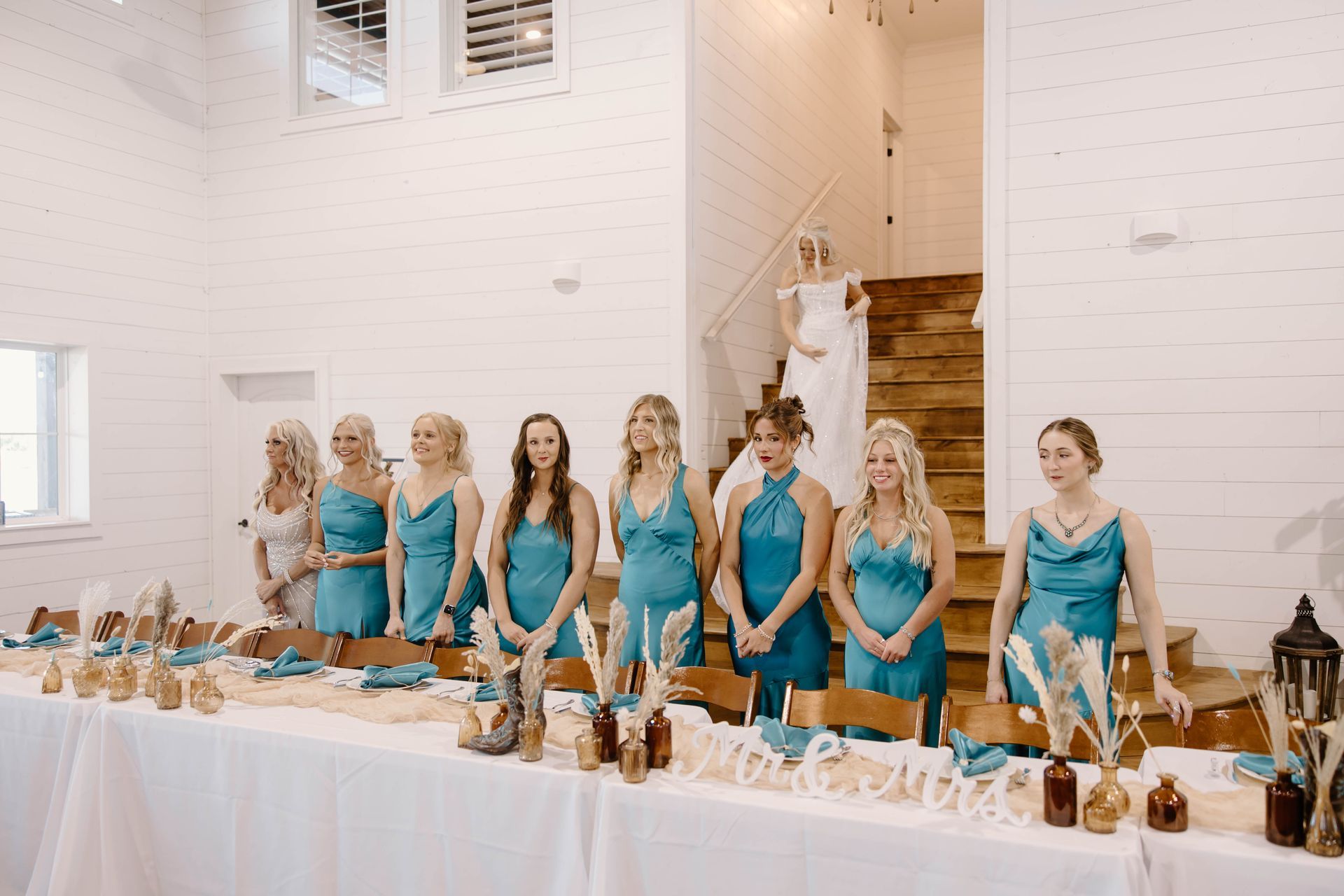 bridesmaids in teal gowns