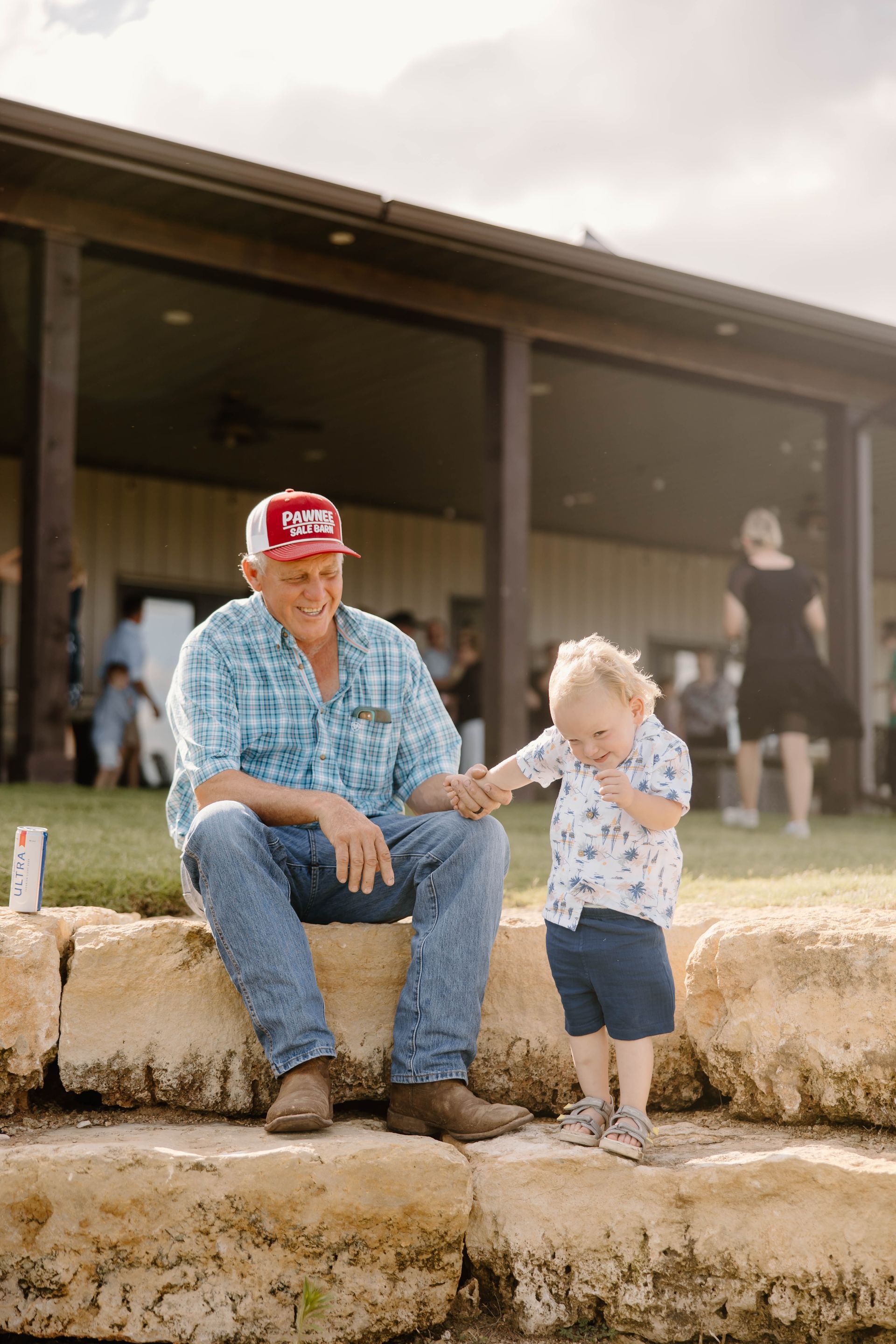 man and little girl at wedding