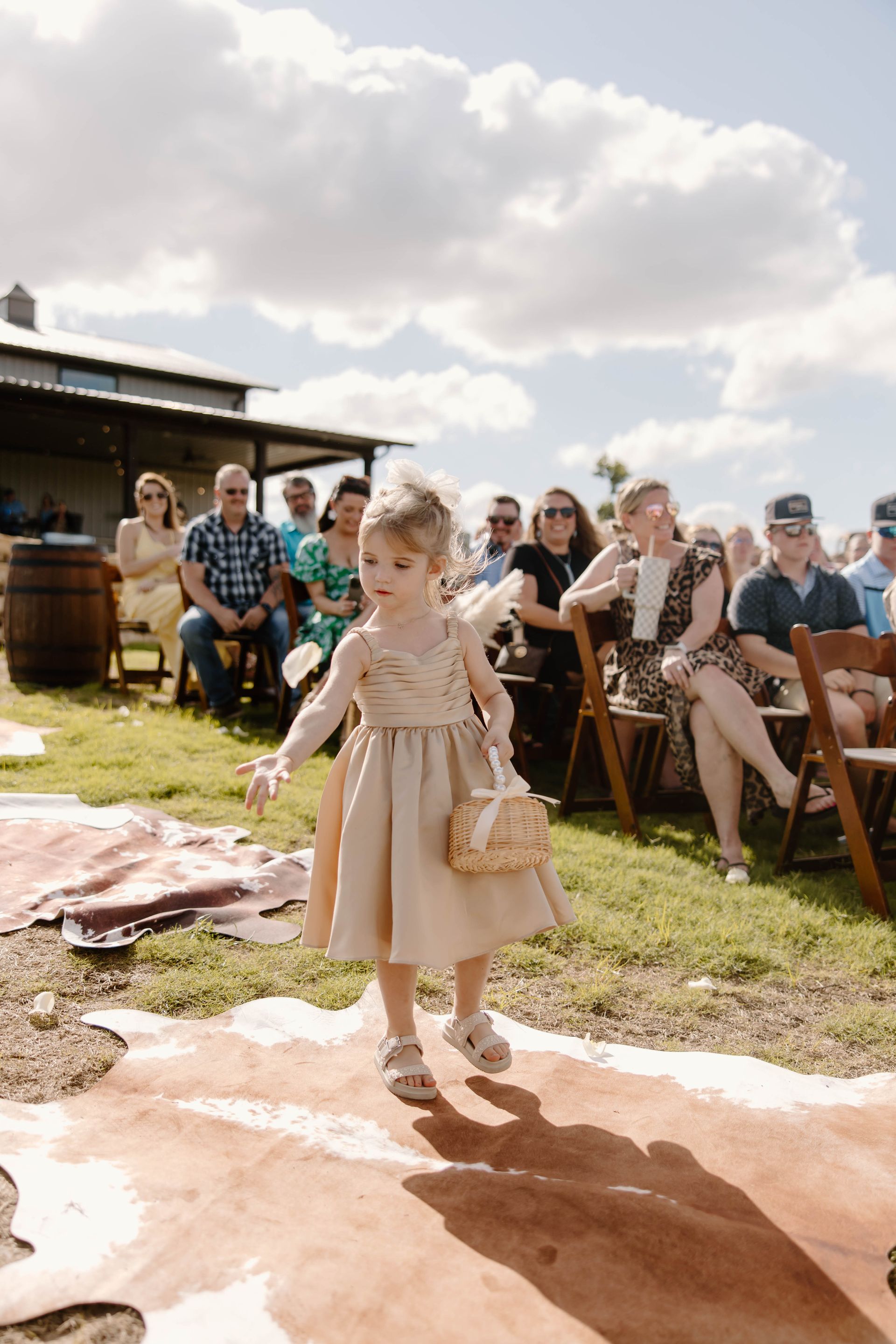 flower girl walking down asile