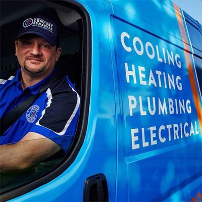 Man in blue uniform in a blue van, with text: