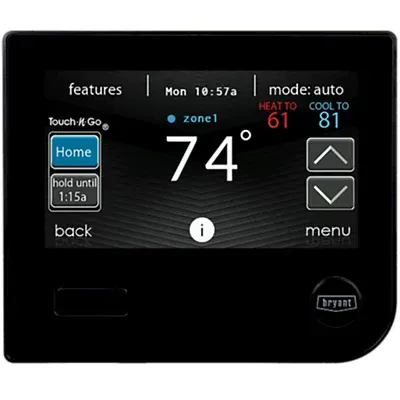 Black Bryant thermostat displaying 74 degrees,